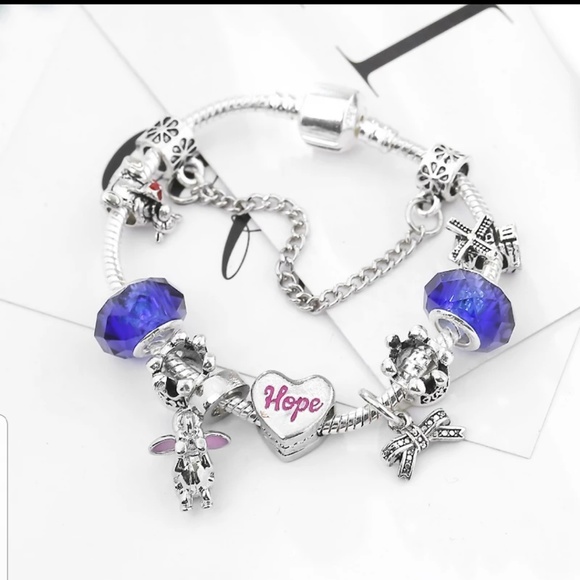 Dumbo, Tigger and Hope Girls Charm Bracelet. - Picture 3 of 3